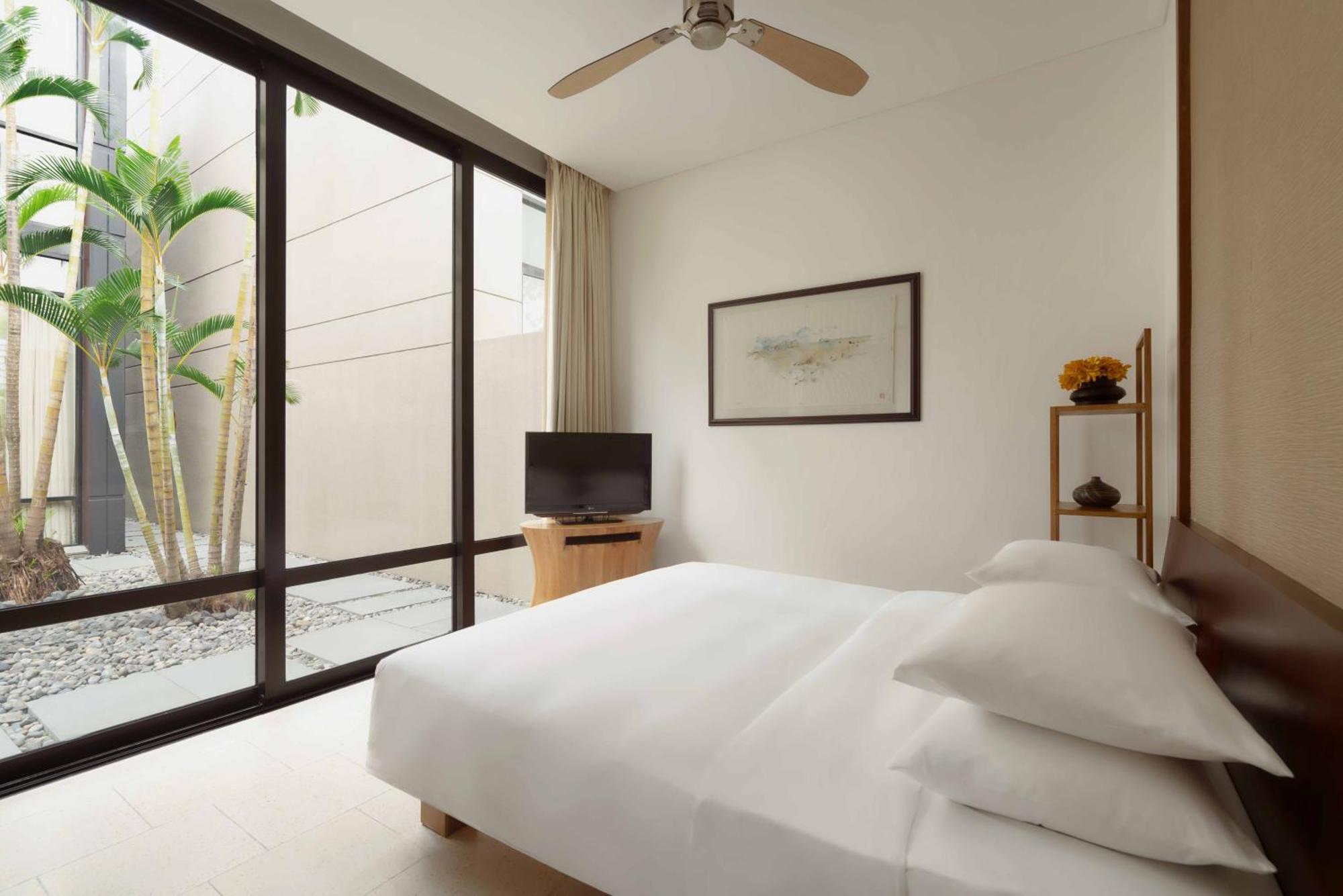 حياة ريجنسي دانينج ريزورت آند سبا دا نانغ المظهر الخارجي الصورة A bedroom at the hotel